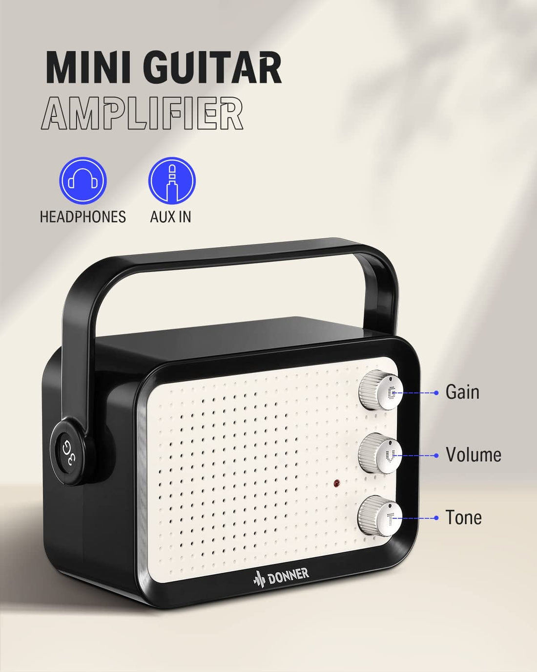 The mini guitar amplifier included in the Donner kit, with gain, volume and tone knobs, headphone output and AUX input